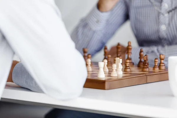 Portrait of two young man playing chess — Stock Photo, Image