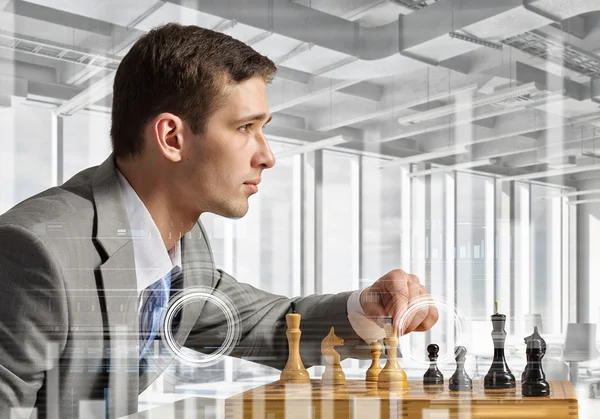 Playing his business strategy — Stock Photo, Image