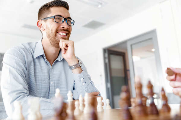 Young man playing chess