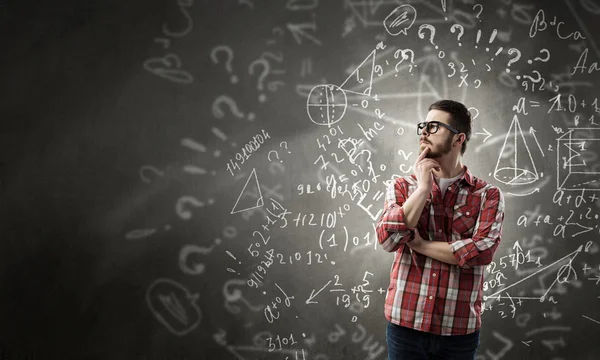 Pensive guy in shirt and glasses — Stock Photo, Image