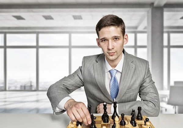 Playing his business strategy — Stock Photo, Image