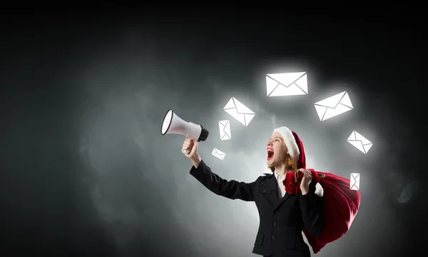 Santa announcing something in megaphone — Stock Photo, Image