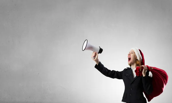 Santa announcing something in megaphone — Stock Photo, Image