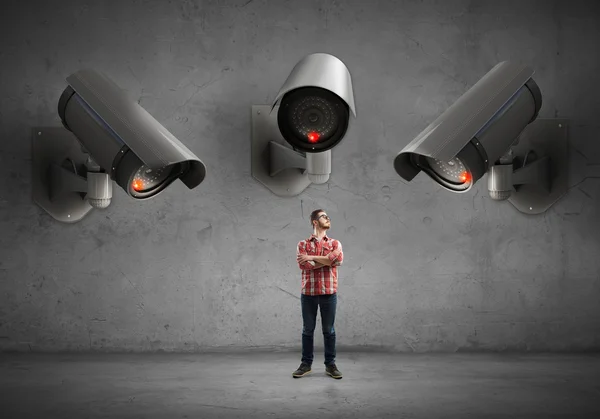 Camera keep an eye on man — Stock Photo, Image