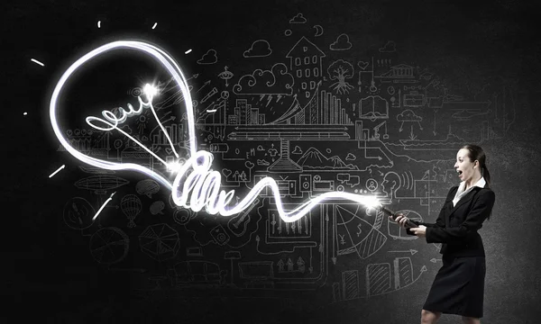 Woman drawing with lantern light — Stock Photo, Image