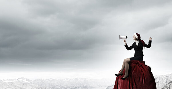 Santa announcing something in megaphone