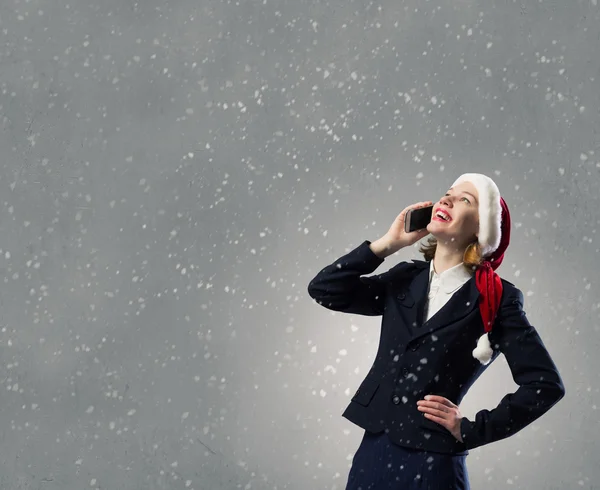 Santa mulher com telefone móvel — Fotografia de Stock