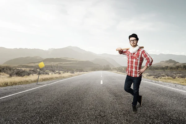 Hipster guy with bat — Stock Photo, Image