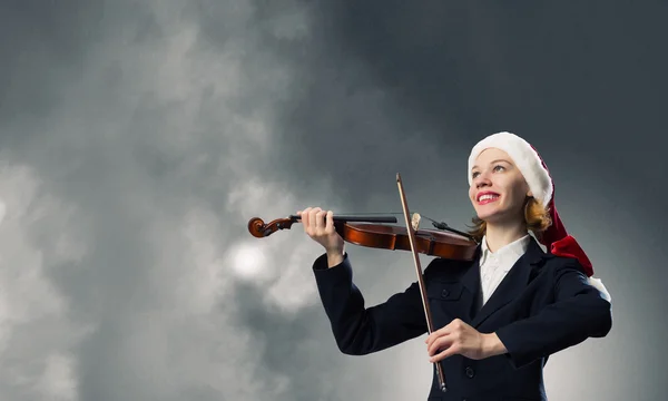 Santa mulher toca violino — Fotografia de Stock