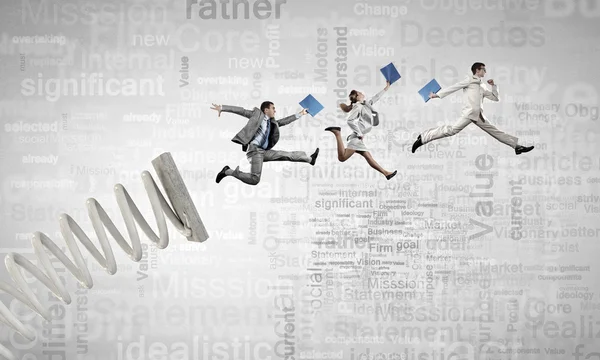 Business people jumping high — Stock Photo, Image