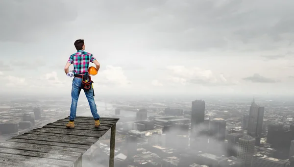 Architect viewing on city from top — Stock Photo, Image