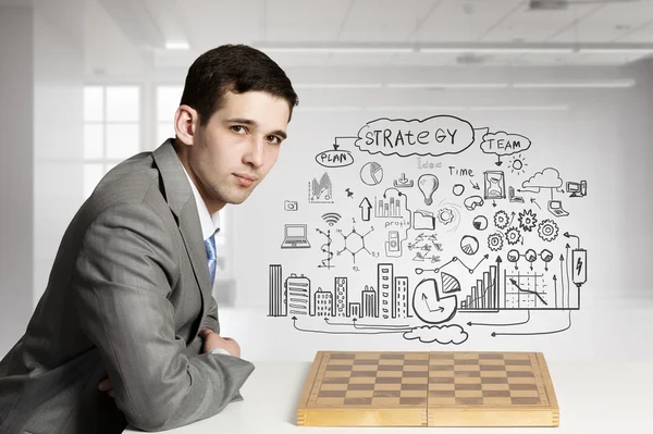 Playing his business strategy — Stock Photo, Image