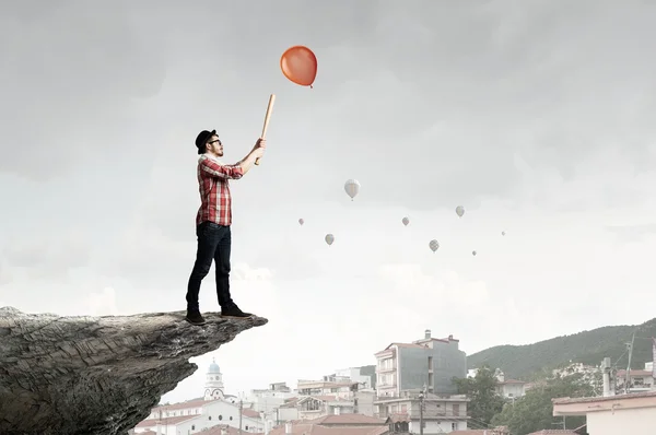 Hipster guy with bat — Stock Photo, Image