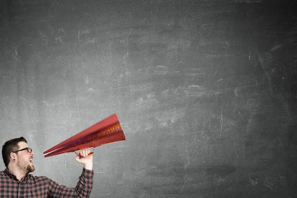 Guy make announcement in trumpet — Stock Photo, Image