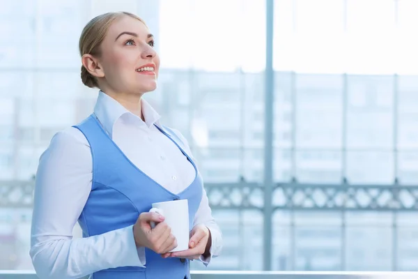 Attractive woman in office building — Stock Photo, Image