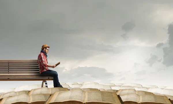 Hipster guy with book in hands — Stock Photo, Image