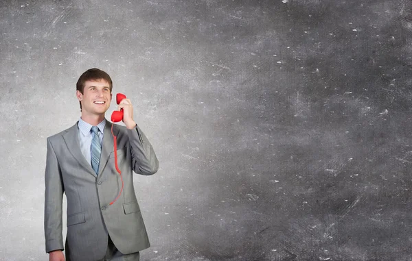 Empresário com receptor vermelho — Fotografia de Stock