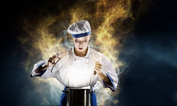 She is magician as cook — Stock Photo, Image