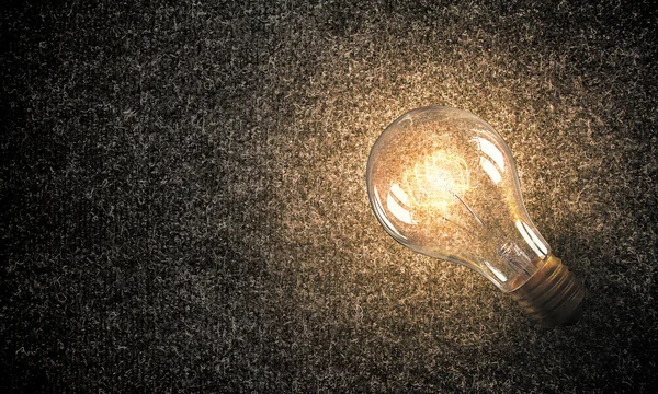 Lampadina sulla superficie del materiale — Foto Stock