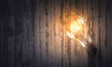 Ampul ahşap yüzey üzerinde