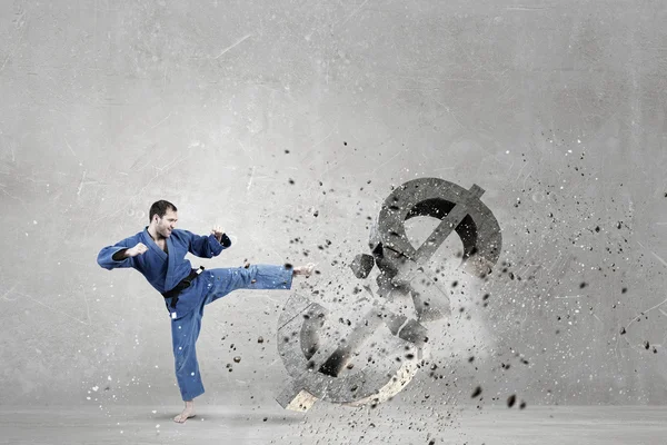 Karate man attack dollar — Stockfoto