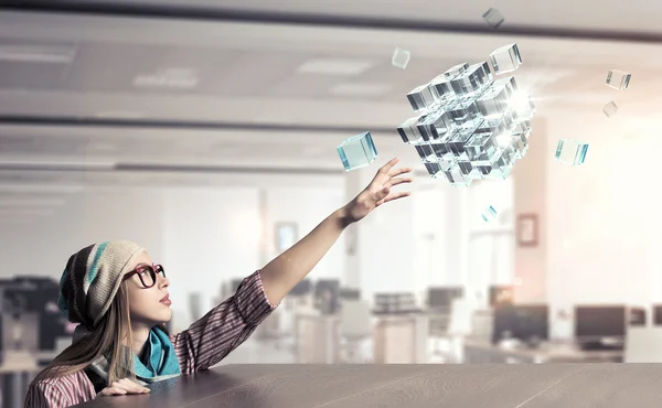 Hipster girl looking from under table — Stock Photo, Image