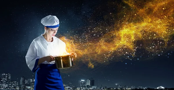 She is magician as cook — Stock Photo, Image