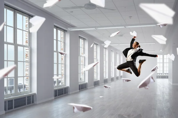 Dancing businesswoman in office — Stock Photo, Image