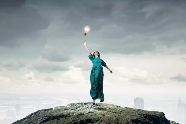 Woman in green dress — Stock Photo, Image