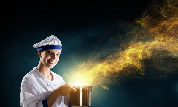 She is magician as cook — Stock Photo, Image