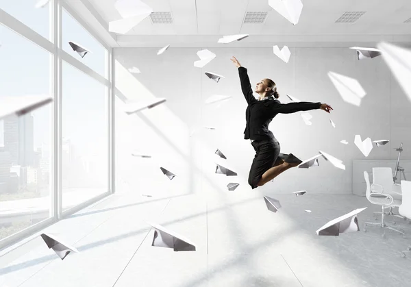 Dancing businesswoman in office — Stock Photo, Image