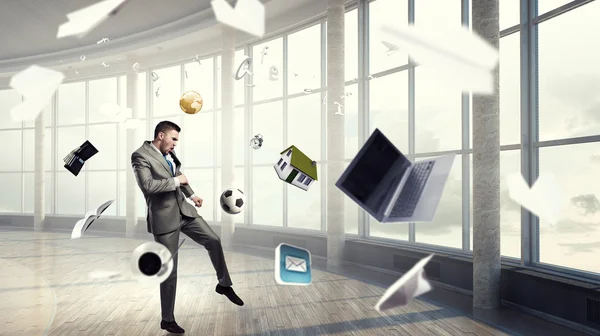 Playing football in office — Stock Photo, Image