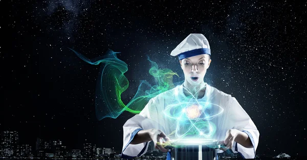 She is magician as cook — Stock Photo, Image