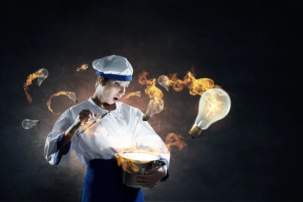 She is magician as cook — Stock Photo, Image