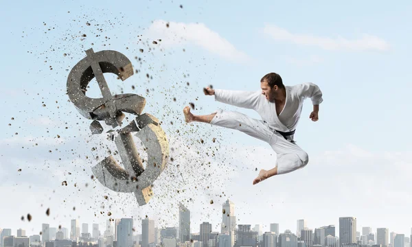 Karate man attack dollar — Stock Photo, Image