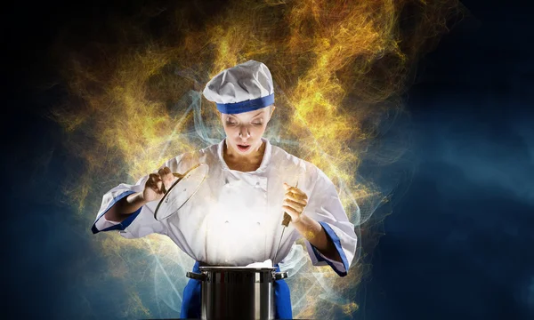 She is magician as cook — Stock Photo, Image