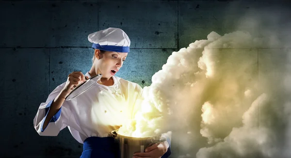 She is magician as cook — Stock Photo, Image