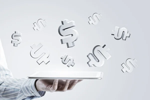 Tablet in hand with symbols — Stock Photo, Image