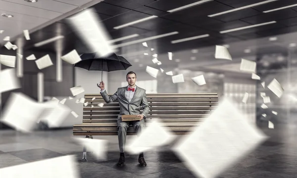 Businessman reading old book — Stock Photo, Image