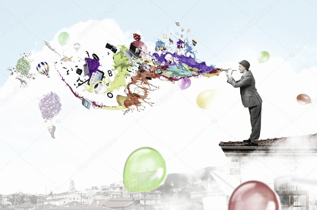 Comedian man play fife Stock Photo by ©SergeyNivens 113485556