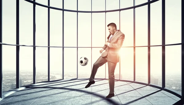 Voetballen in office. 3D render — Stockfoto