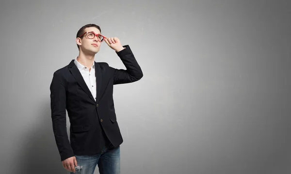 Thoughtful handsome guy . Mixed media — Stock Photo, Image