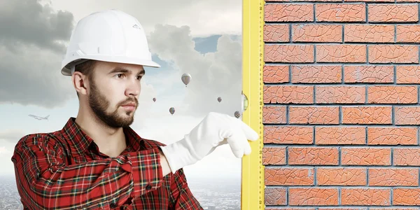 Young engineer man . Mixed media — Stock Photo, Image