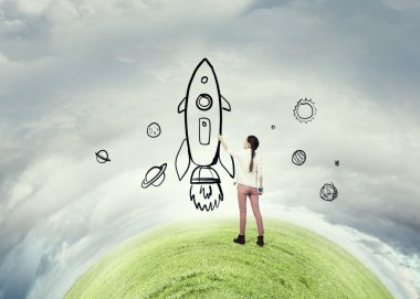 Kız çizim roket. Karışık teknik