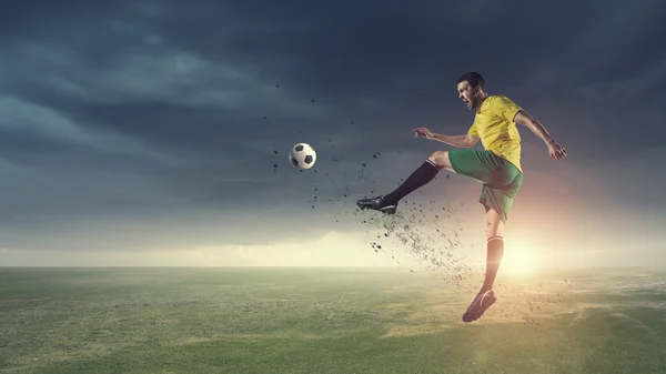 Hot football-speler. Mixed media — Stockfoto