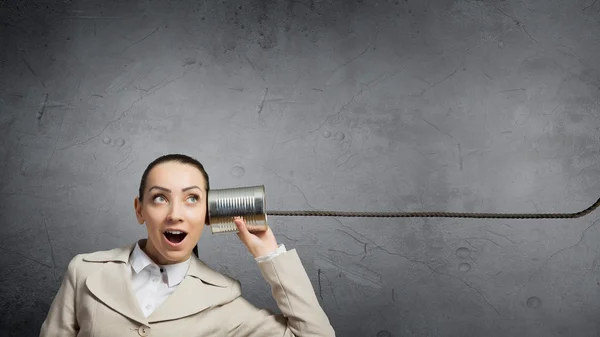 Vrouw met behulp van doven telefoon. Mixed media — Stockfoto