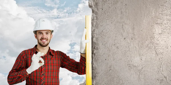 Young engineer man . Mixed media — Stock Photo, Image