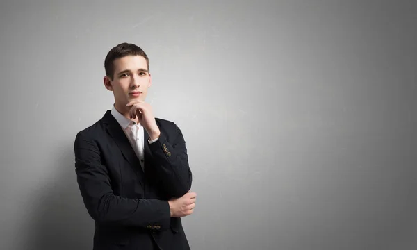 Thoughtful handsome guy . Mixed media — Stock Photo, Image