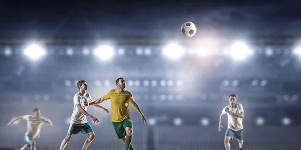Soccer game in action . Mixed media — Stock Photo, Image