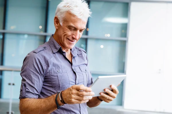 Handsome businessman in office — Stock Photo, Image